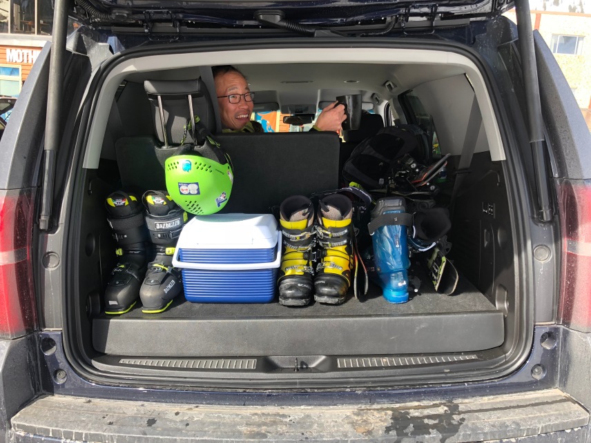 Jin with a full trunk of ski gear.